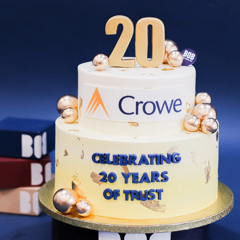 Lucky Yellow Corporate Cake with Gold Balls and Company Logo